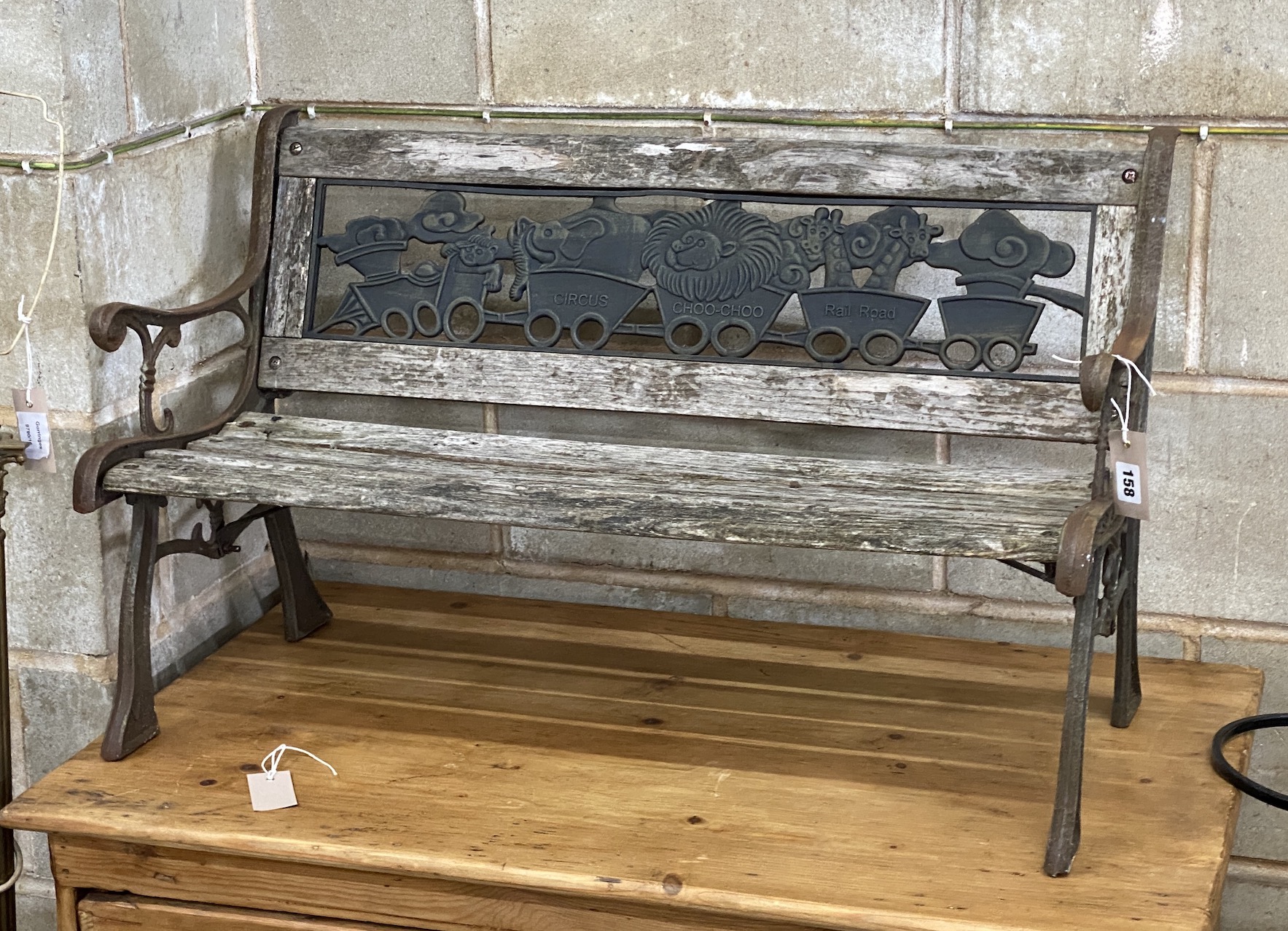 A child's slatted garden bench